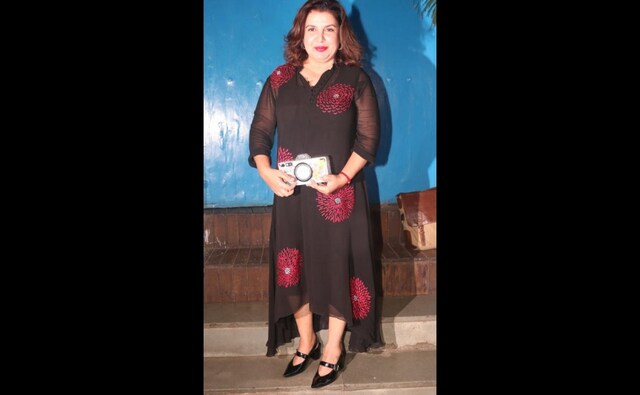 Farah Khan attends Uri's success bash in a maroon and black dress Farah Khan attends Uri's success bash in a maroon and black dress
